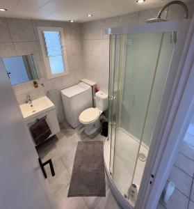 Et badeværelse på Appartement T3 grand jardin