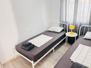 Postel nebo postele na pokoji v ubytování Townhouse Dreamhills Los Altos