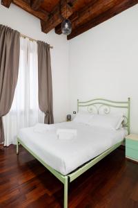 Cama o camas de una habitación en San Marco Canal View by Bricola Apartments