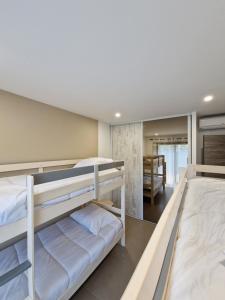 Postel nebo postele na pokoji v ubytování Villa ALVALMAX + 32 fotografií