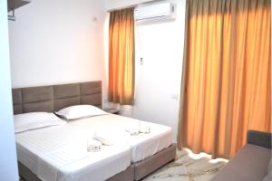 Letto o letti in una camera di Star Hotel & Restaurant