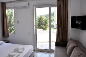 Letto o letti in una camera di Star Hotel & Restaurant