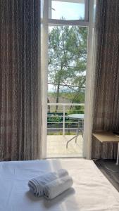 Letto o letti in una camera di Grand Hotel Kobuleti