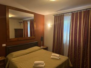 Postel nebo postele na pokoji v ubytování Park Hotel Serenissima