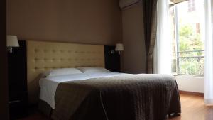 Voodi või voodid majutusasutuse Hotel Nautilus toas
