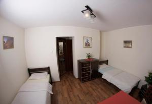 Postel nebo postele na pokoji v ubytování Euro Zajazd - Casa Di Fulvio Maria Viola