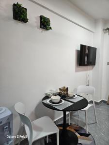 A television and/or entertainment centre at City haven Accommodation studios by Jeyem-Nandwa Ivy kileleshwa