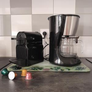 a blender sitting on top of a kitchen counter at Le Nid de Pie in Le Russey +1 photo