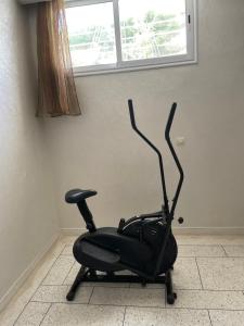 Fitness centrum a/nebo fitness zařízení v ubytování Appartement 2 chambres avec lit bébé