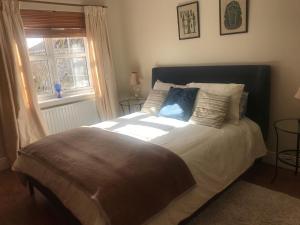 Krevet ili kreveti u jedinici u okviru objekta King En-Suite Bedroom