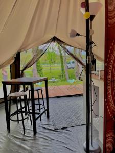 Patio alebo iná vonkajšia časť ubytovania village vacances du camboussel