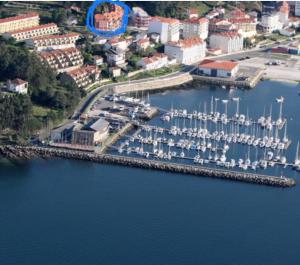 an aerial view of a marina with boats in the water at Portosin Sea&Pool in Portosin