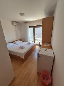 Katil atau katil-katil dalam bilik di Apartments and Rooms Mamić