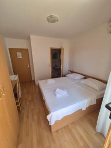 Katil atau katil-katil dalam bilik di Apartments and Rooms Mamić