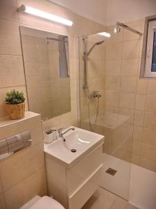 Koupelna v ubytování Apartmány Šafran Štrba