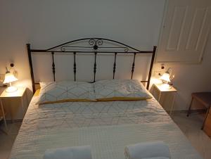 Postel nebo postele na pokoji v ubytování Borgo Family Suite