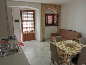 Posezení v ubytování Borgo Family Suite
