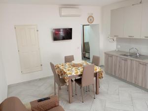Kuchyň nebo kuchyňský kout v ubytování Borgo Family Suite