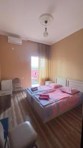 Letto o letti in una camera di Grand Hotel Kobuleti