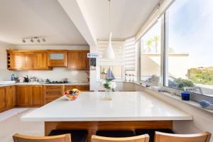 Kuhinja oz. manjša kuhinja v nastanitvi Seagull Penthouse Marsaxlokk