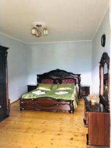 Postel nebo postele na pokoji v ubytování Guest House Vivaushba