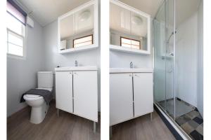 a bathroom with a toilet and a glass shower at 08, ontdek het bosrijke Oisterwijk met het grootste terras van Nederland! in Oisterwijk +21 photos