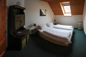 Postel nebo postele na pokoji v ubytování Penzion2004