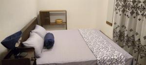 Postel nebo postele na pokoji v ubytování Cottage 49s weligama