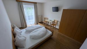 Postel nebo postele na pokoji v ubytování Garni Diamant