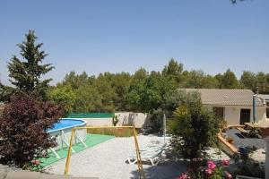an image of a backyard with a pool at Villa Carmeryl in Venta del Baúl