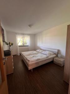 Postel nebo postele na pokoji v ubytování Apartmán Sadová 430