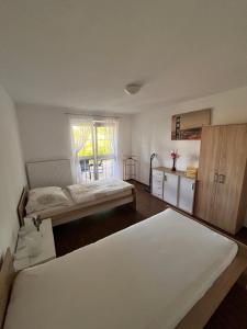Postel nebo postele na pokoji v ubytování Apartmán Sadová 430