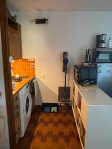 Kuchyň nebo kuchyňský kout v ubytování Appartement 4 couchages avec terrasse