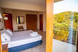 Postel nebo postele na pokoji v ubytování Hotel Bisanzio Resort