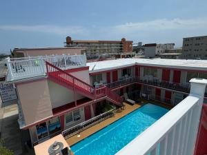 arial view of a building with a swimming pool at El Ray Motel in Wildwood