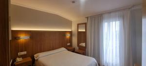 Postel nebo postele na pokoji v ubytování Hotel Campomar 3*** Superior