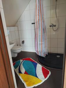 Łazienka w obiekcie Pokoje i Apartamenty u Anny