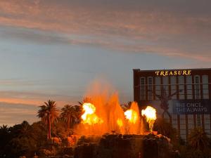 a fire show in front of a building with flames at TravelUSANVPahrump in Pahrump