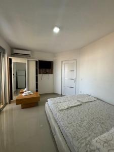 Ένα ή περισσότερα κρεβάτια σε δωμάτιο στο Apartmani ZMS
