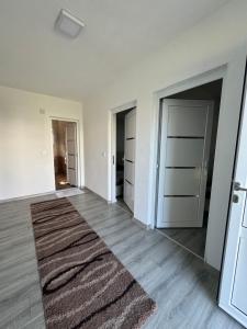 Ένα ή περισσότερα κρεβάτια σε δωμάτιο στο Apartmani ZMS