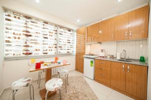 A kitchen or kitchenette at Zengin City Hotel