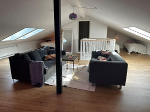 Uma área de estar em Gistrup Getaway