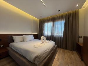 Letto o letti in una camera di Gaia Pyramids View INN