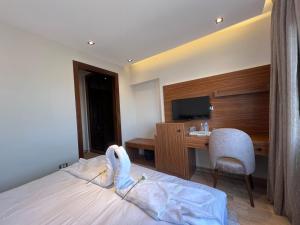 Letto o letti in una camera di Gaia Pyramids View INN