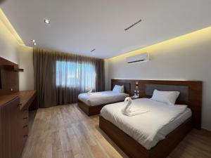 Letto o letti in una camera di Gaia Pyramids View INN