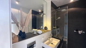 Koupelna v ubytování Luxe B&B "In de Schulp", ontspan en geniet van comfort en stijl