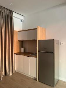 Kuchyň nebo kuchyňský kout v ubytování NK Residence