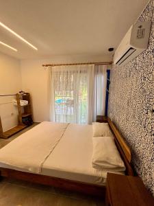 Ένα ή περισσότερα κρεβάτια σε δωμάτιο στο ViLLA DALAMAN - AİRPORT