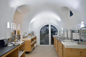 A kitchen or kitchenette at Appartement-Hotel GH Zum Goldenen Schiff