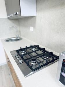 Η κουζίνα ή μικρή κουζίνα στο Двокімнатна квартира на Корятовича, 2Б